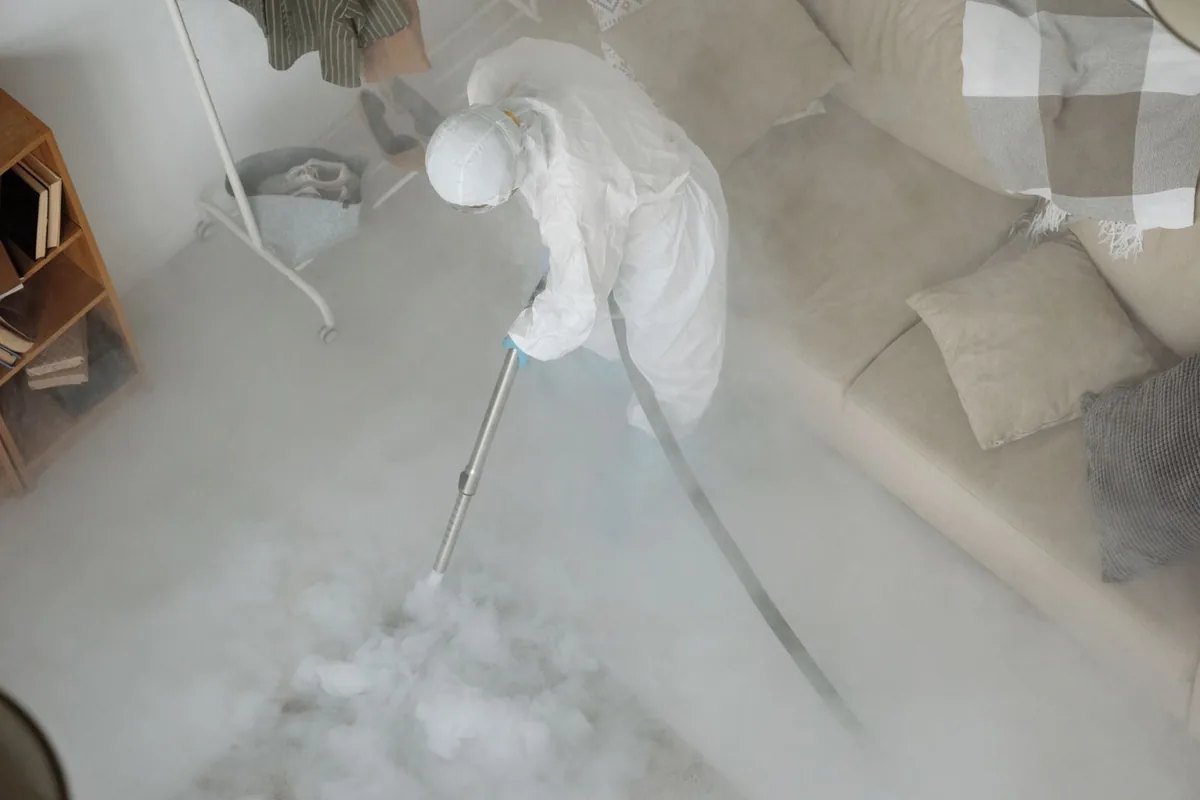 Biohazard cleanup technician in protective equipment, Atlantic, Seattle, WA